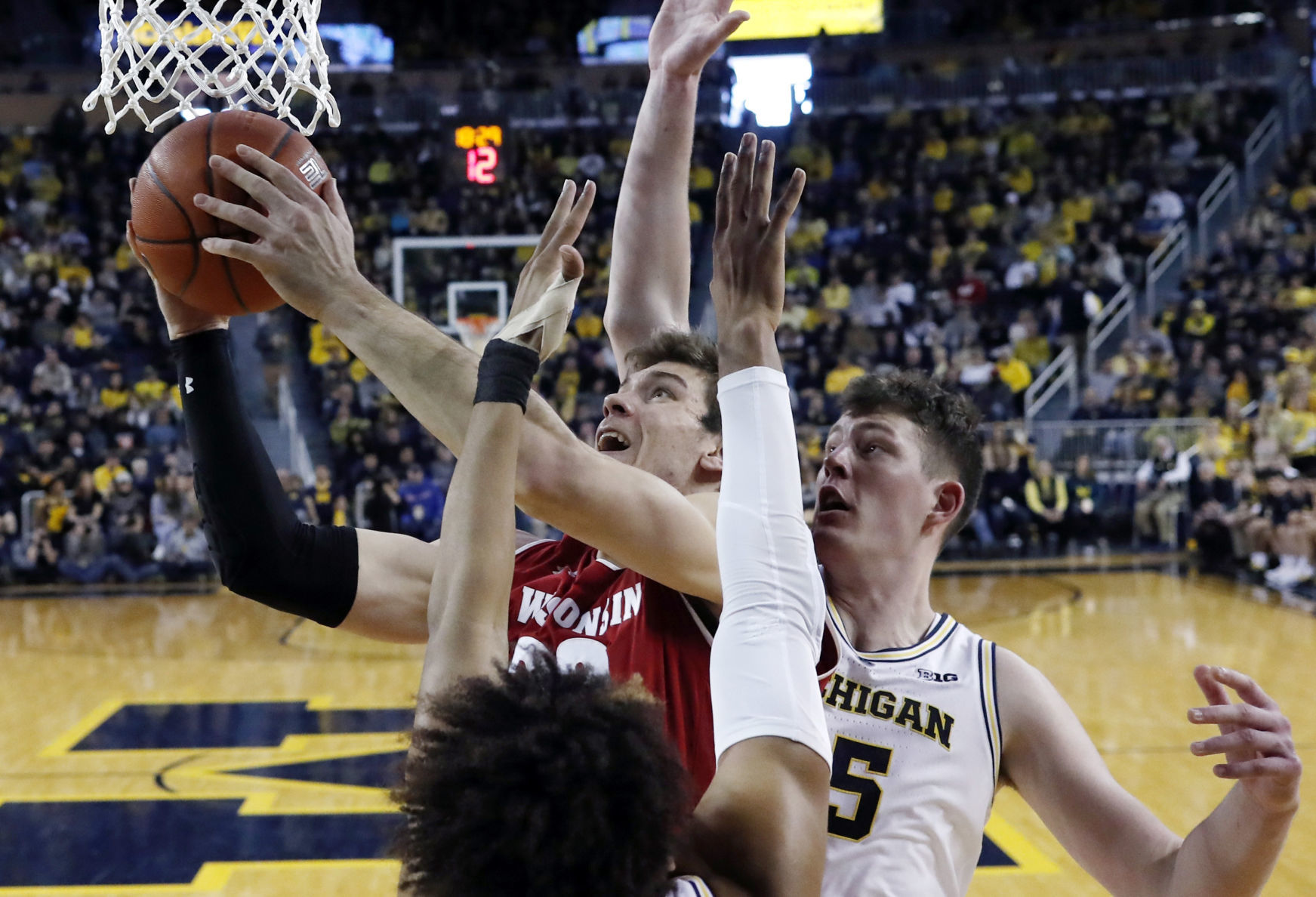 No. 7 Wolverines 61, No. 19 Badgers 52